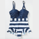 Illustration for article titled Free Your Mind, Wear a Skirted Swimsuit This Summer